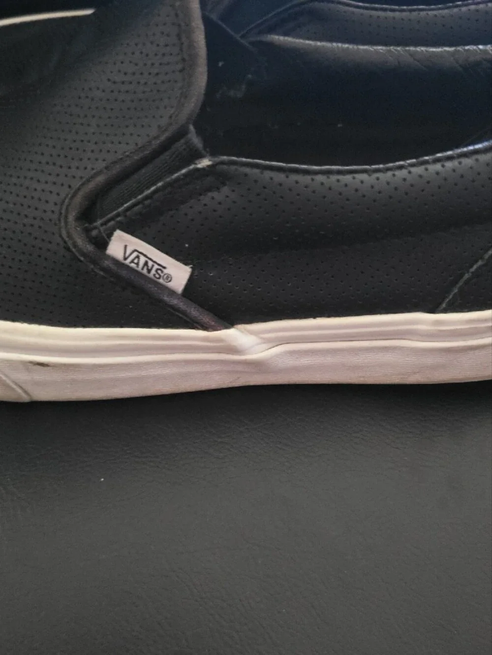 Vans Black Slip-On Leather-Textured Casual Sneakers with White Sole